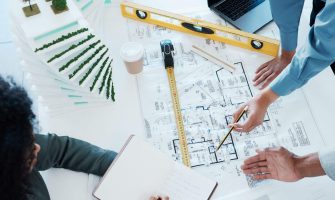 architect-paper-and-blueprint-with-meeting-plann-2023-11-27-05-00-22-utc.jpg
